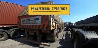 Descendo a serra da Via Anchieta e entendendo as siglas do mercado financeiro Caminhão longo no pátio esperando apoio para descer a Serra da Via Anchieta