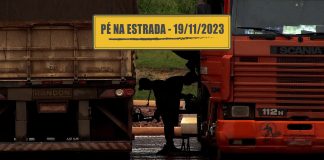 Família de guincheiros e falta de motorista qualificado Motoristas parados num pátio de posto